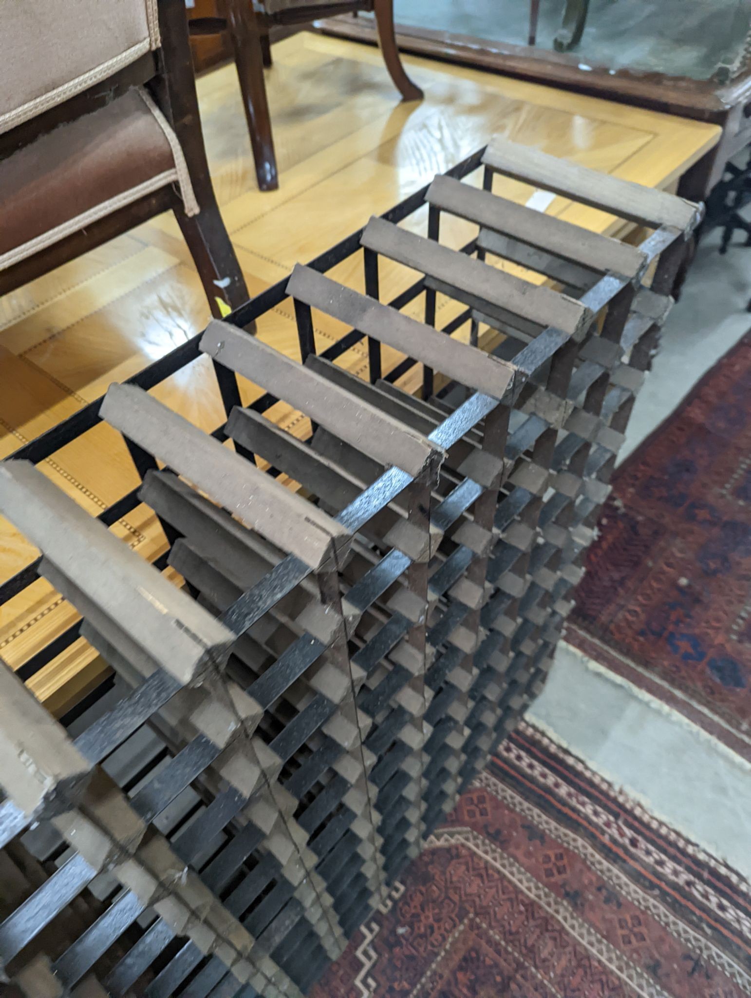 A 99 bottle wine rack, width 90cm